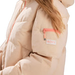 Roxy Women's Alofted Puffy Insulated Jacket 2025 - A cream-colored puffer jacket with a zippered pocket on the upper arm and a hood.