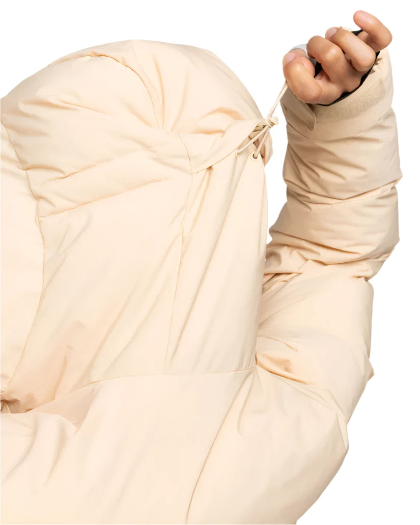 Roxy Women's Alofted Puffy Insulated Jacket - A cream-colored puffer jacket with a hood and drawstring waist, featuring a zippered front and two side pockets.