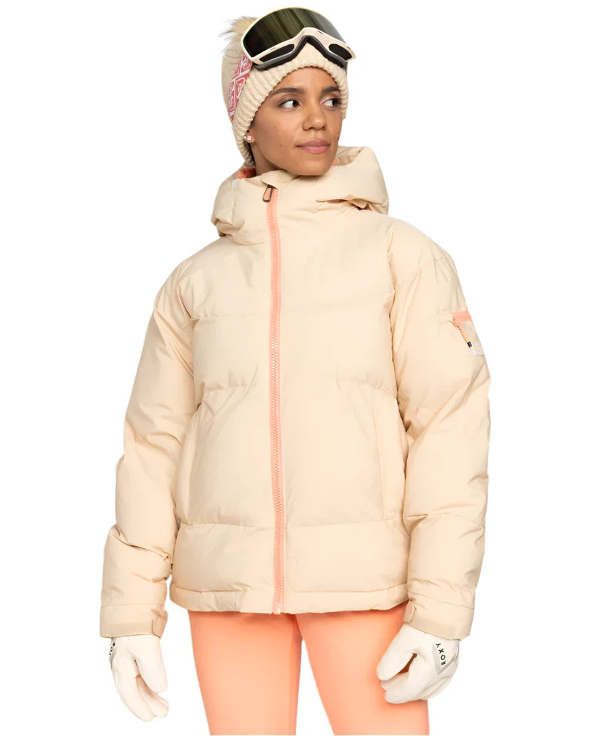 Roxy Women's Alofted Puffy Insulated Jacket - A cream-colored puffer jacket with a hood and zippered front, featuring a small logo on the left sleeve.