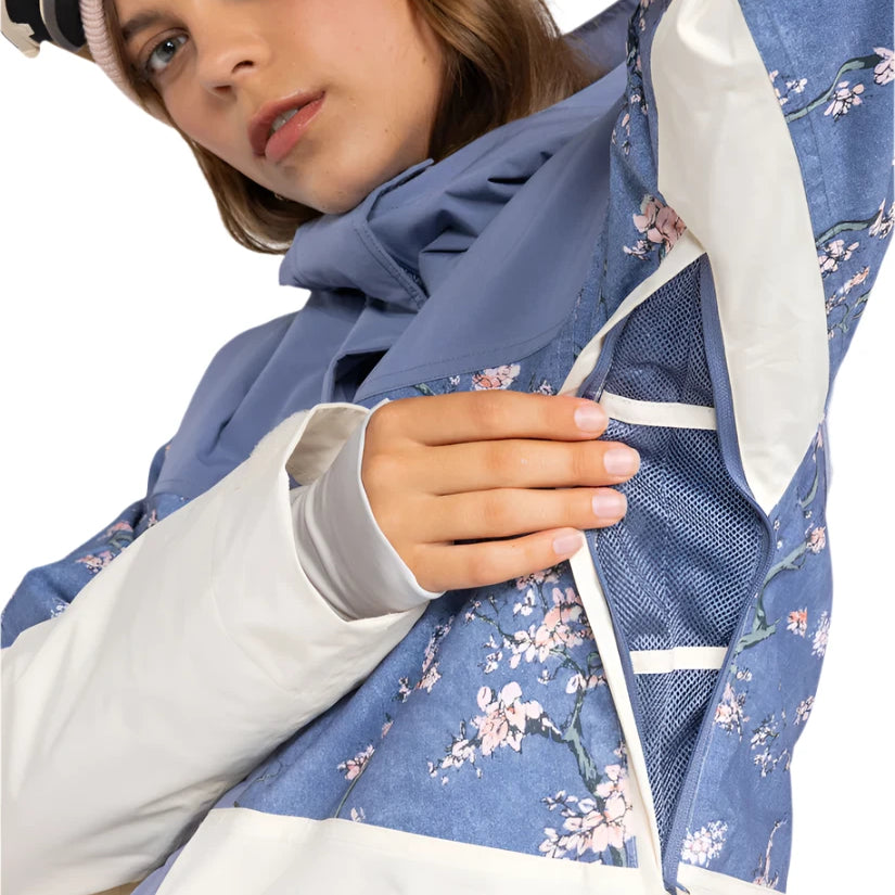 Roxy Women's Chloe Kim Parka Jacket 2025 - A blue parka jacket with a floral pattern and white accents on the sleeves, hood, and trim.