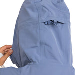 Roxy Women's Chloe Kim Parka Jacket 2025 - A light blue parka jacket with a hood and drawstring waist, featuring a zip closure and two front pockets.