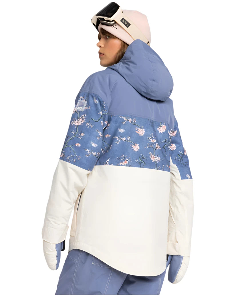 Roxy Women's Chloe Kim Parka Jacket 2025 - A blue parka jacket with a floral pattern on the upper back and hood, featuring a white stripe at the bottom.
