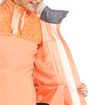 Roxy Women's Meade Insulated Jacket - A peach-colored jacket with a geometric pattern on the upper chest area, featuring a zippered pocket and adjustable cuffs.