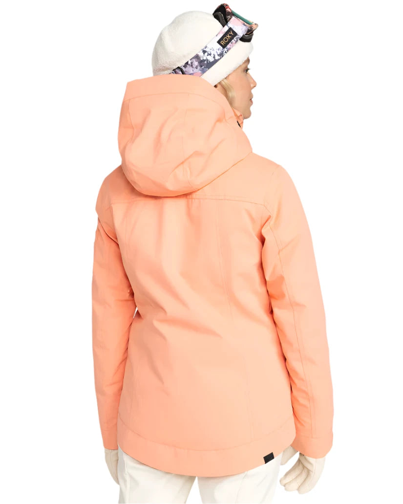Roxy Women's Meade Insulated Jacket - A peach-colored jacket with a hood, featuring a black zipper and two zippered pockets on either side.