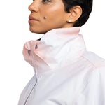 Roxy Women's Jet Ski Insulated Jacket - A woman with short black hair and a mole on her cheek is wearing this jacket, which has a light pink color with darker pink accents around the collar and down the front zipper.