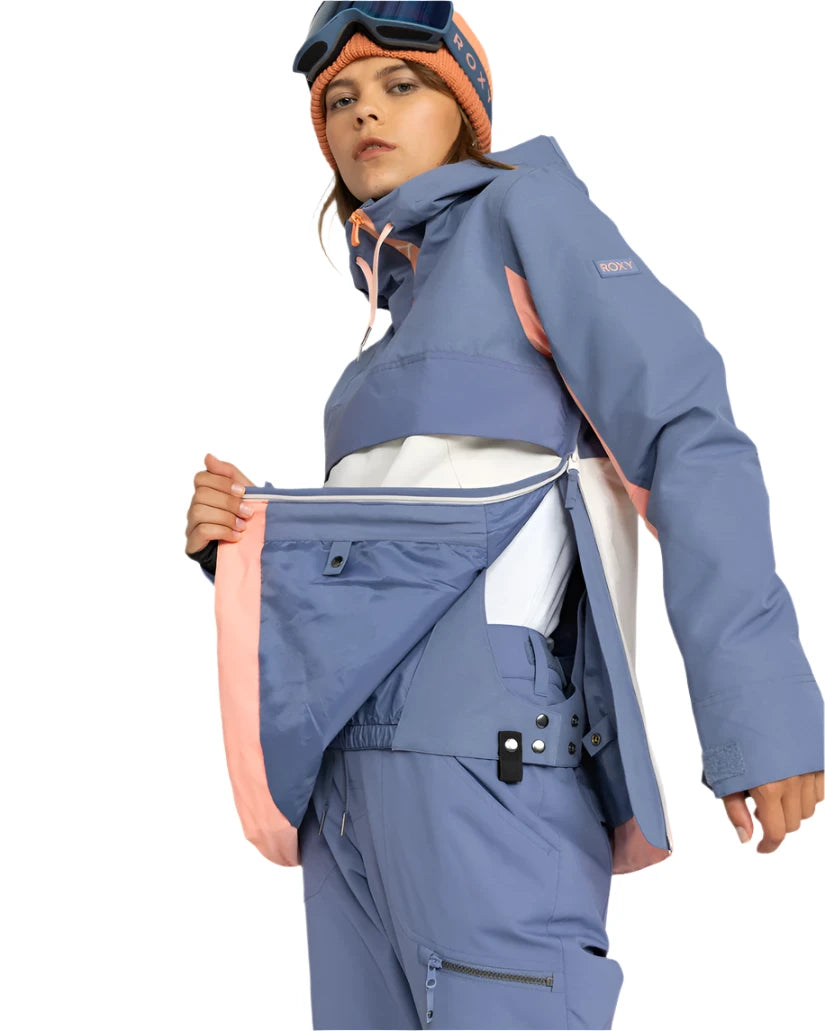 Roxy Women's Shelter Insulated Jacket 2025 - A blue and pink insulated jacket with a hood, worn by a model against a white background.