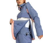 Roxy Women's Shelter Insulated Jacket 2025 - A blue and pink insulated jacket with a hood, worn by a model against a white background.