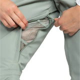 Roxy Women's Rideout Insulated Bib Pant 2025 - A pair of light gray snow pants with a zippered pocket on the right thigh and a small black logo on the left leg.