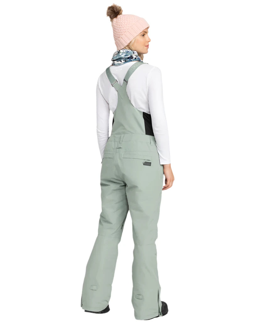Roxy Women's Rideout Insulated Bib Pant 2025 - A pair of light gray snow pants with a black waistband and belt loops.
