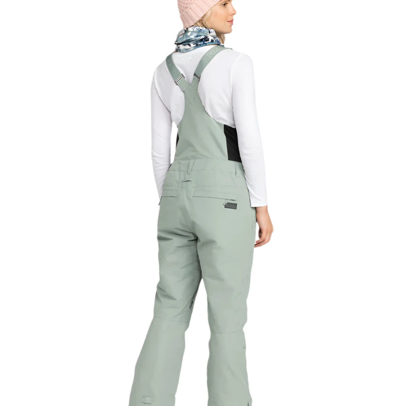 Roxy Women's Rideout Insulated Bib Pant 2025 - A pair of light gray snow pants with a black waistband and belt loops.