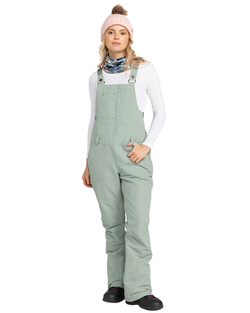 Roxy Women's Rideout Insulated Bib Pant 2025 - A pair of light gray snow pants with a subtle pattern and multiple pockets, featuring adjustable straps and a zippered fly.