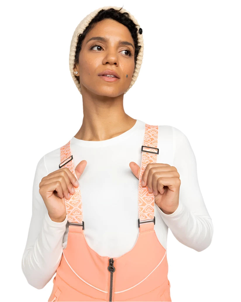 Roxy Women's Summit Bib Shell Pant 2025 - A pair of bib shell snow pants in a light blue color with white accents and a subtle pattern on the straps.