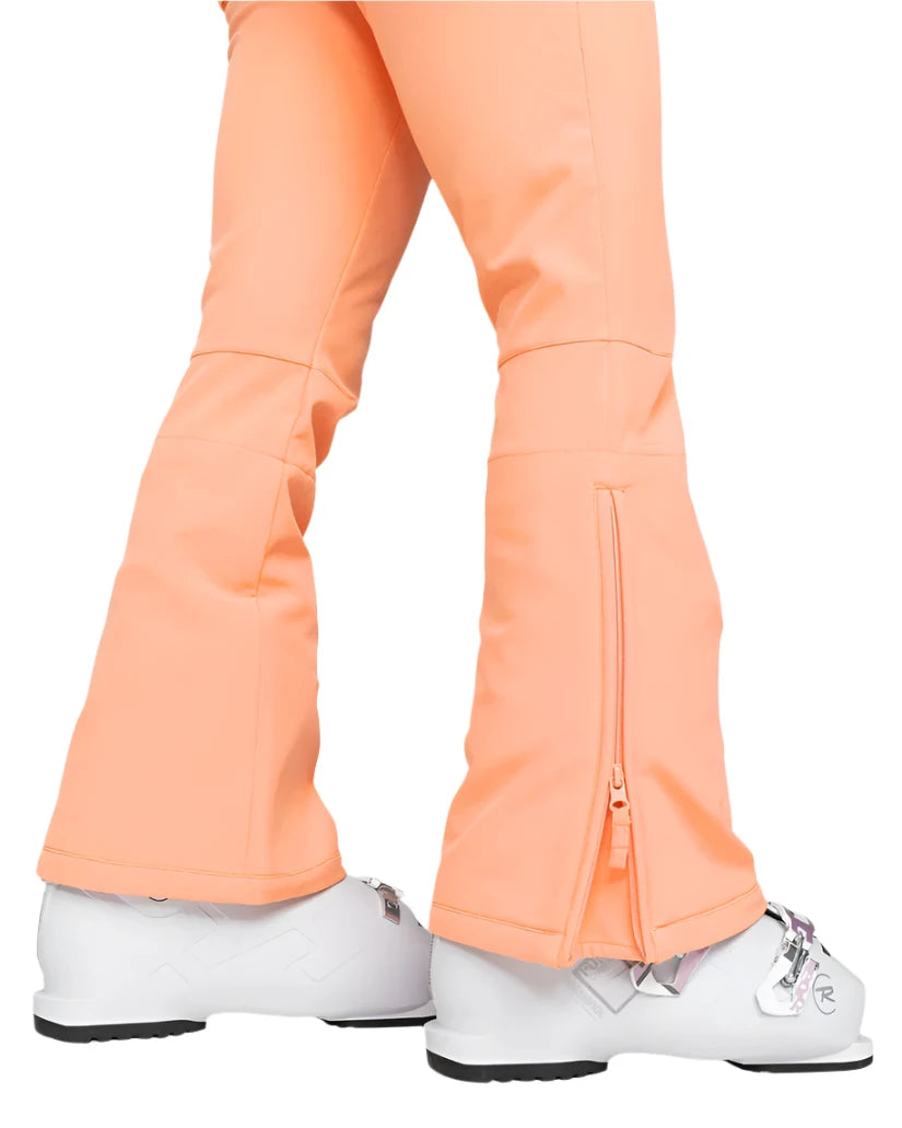 Roxy Women's Summit Bib Shell Pant 2025 - A pair of peach-colored snow pants with a zippered pocket on the left thigh and a small, silver zipper pull.