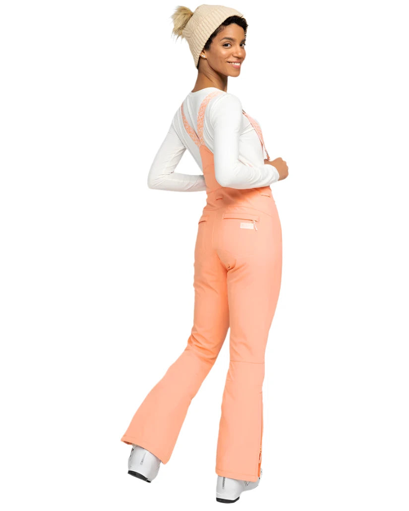 Roxy Women's Summit Bib Shell Pant 2025 - A pair of bib shell snow pants in a light blue color with a subtle pattern on the side pockets.