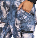 Roxy Women's Nadia Print Insulated Pant 2025 - A blue and white abstract print pant with a black drawstring on the waistband.