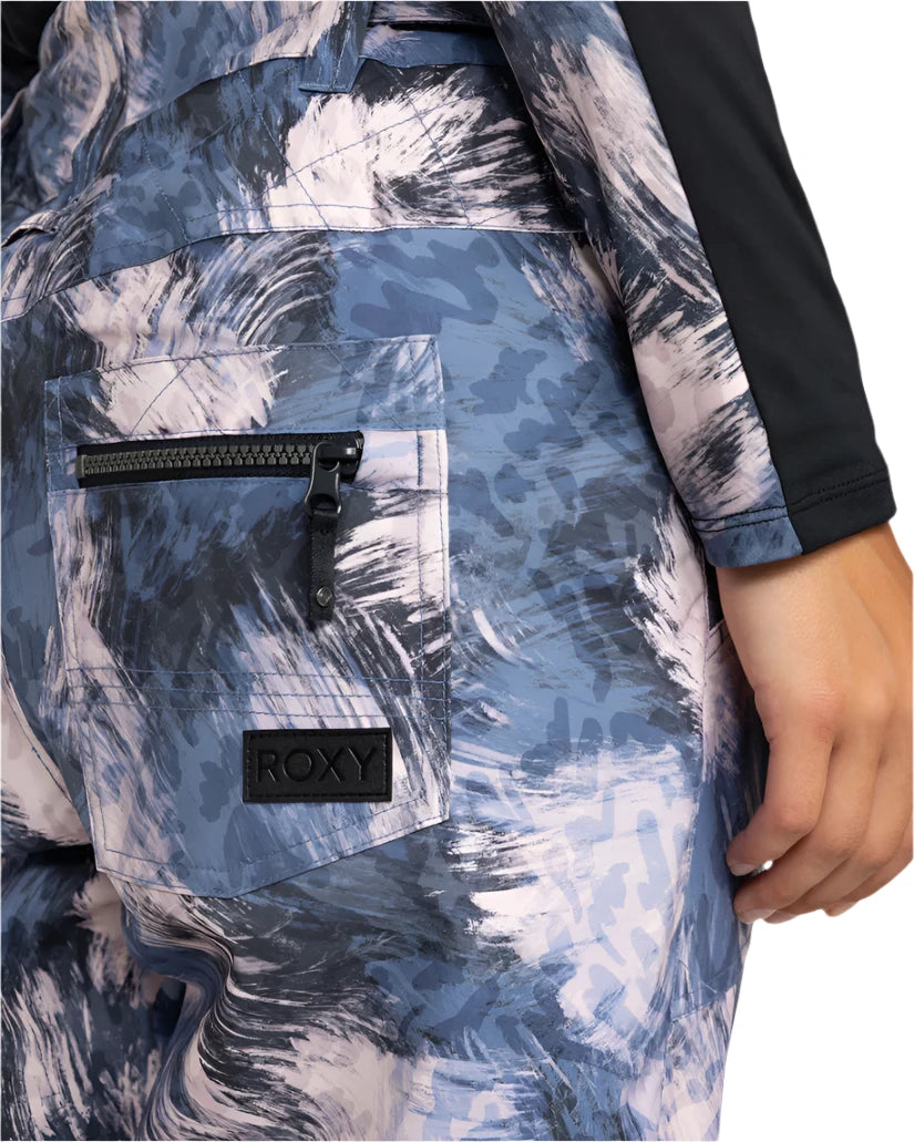 Roxy Women's Nadia Print Insulated Pant 2025 - A blue and white abstract print pant with a black zipper on the back pocket.