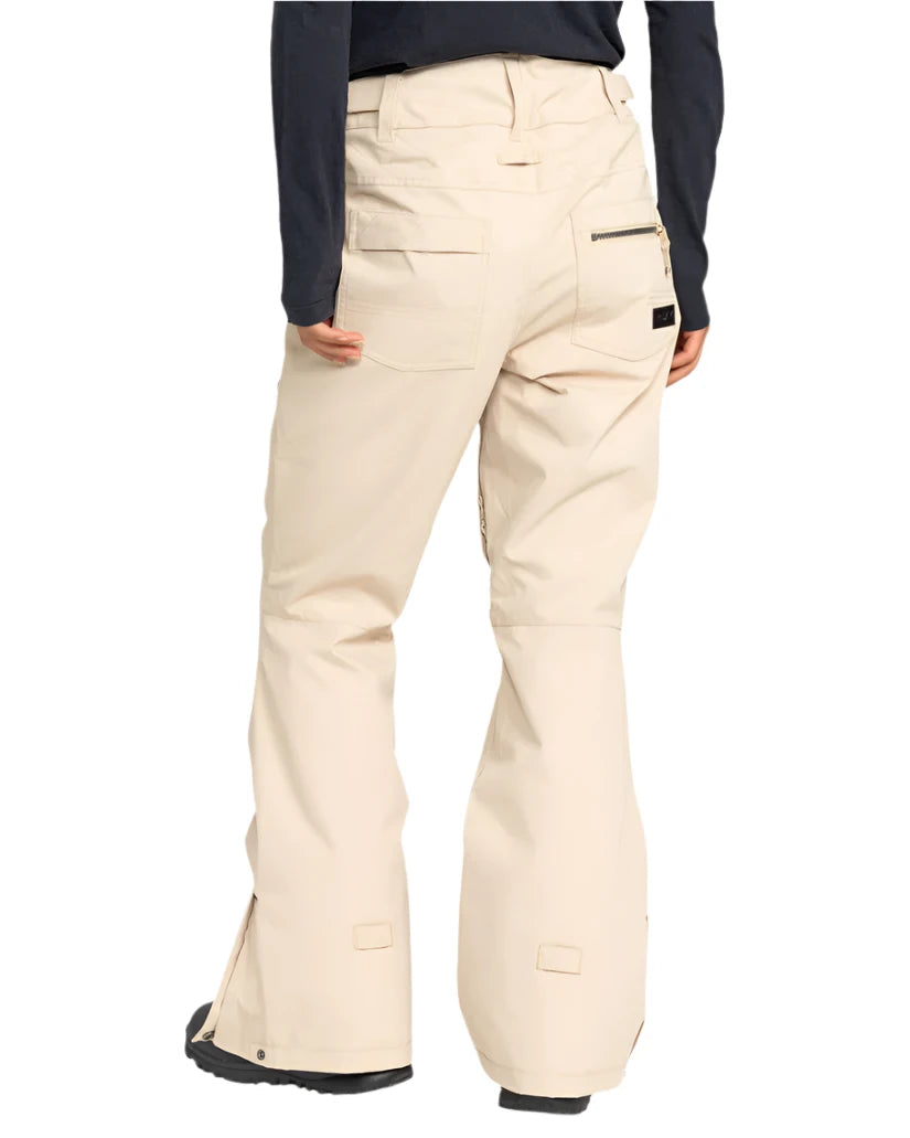 Roxy Women's Nadia Insulated Pant 2025 - A pair of cream-colored snow pants with a zippered pocket on the right thigh and two front pockets.