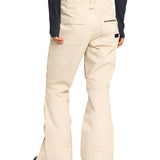 Roxy Women's Nadia Insulated Pant 2025 - A pair of cream-colored snow pants with a zippered pocket on the right thigh and two front pockets.