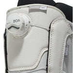 Vans Women's Encore OG Snowboard Boot 2025 - A white snowboard boot with a black strap on top and a gray logo on the side.