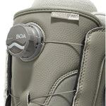 Vans Women's Encore Pro Snowboard Boot 2025 - A gray snowboard boot with a textured pattern on the side and a round BOA dial on the front.
