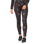 Krimson Klover Women's Multi Skiers Legging - A pair of black leggings with a repeating pattern of skiers in various colors, including red, blue, yellow, and white.