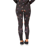 Krimson Klover Women's Multi Skiers Legging 2025 - A pair of black leggings with a repeating pattern of skiers in various colors.