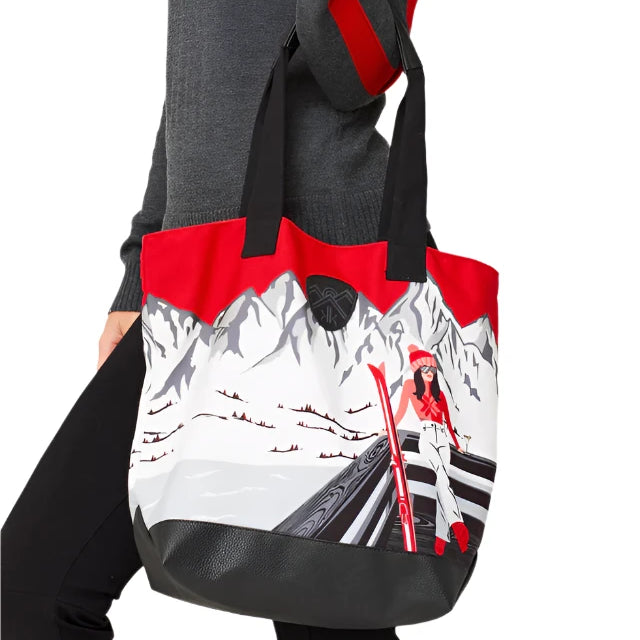 Krimson Klover Women's Illustrated Tote 2025 - A gray tote with a red and black illustration of skiers on the front.