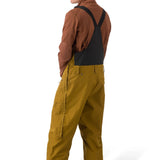 Flylow Firebird Bib - A pair of brown snow pants with a black logo on the left leg and a zippered pocket on the right thigh.
