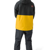 Flylow Knight Anorak Jacket - A black jacket with a yellow stripe across the chest and down the back, featuring a hood and zippered pockets.