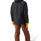 Flylow Patrol Jacket 2025 - A black jacket with a hood, featuring a white logo on the left chest and a small white tag on the right sleeve.
