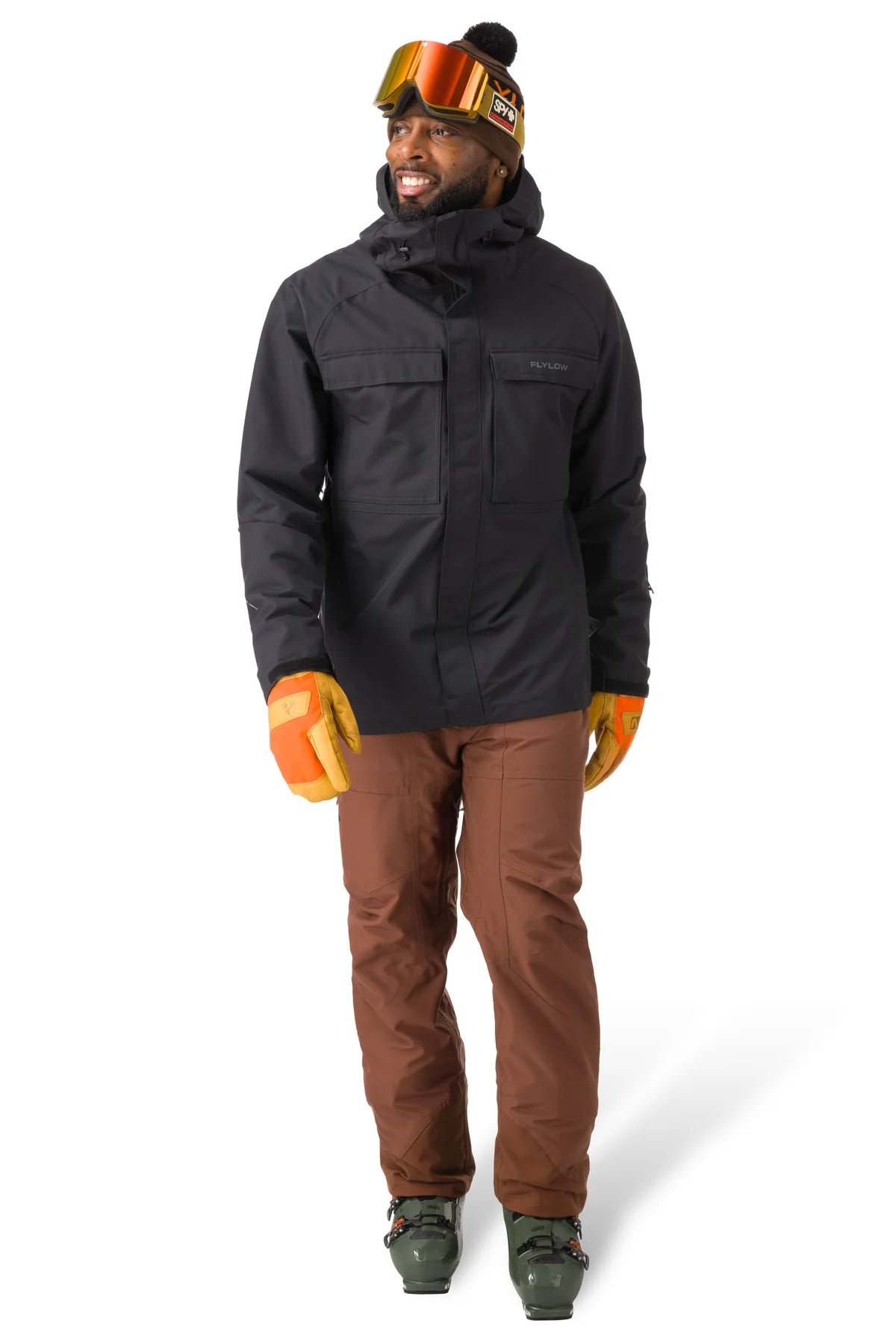 Flylow Patrol Jacket 2025 - A black jacket with two chest pockets, one zippered and one snap buttoned.