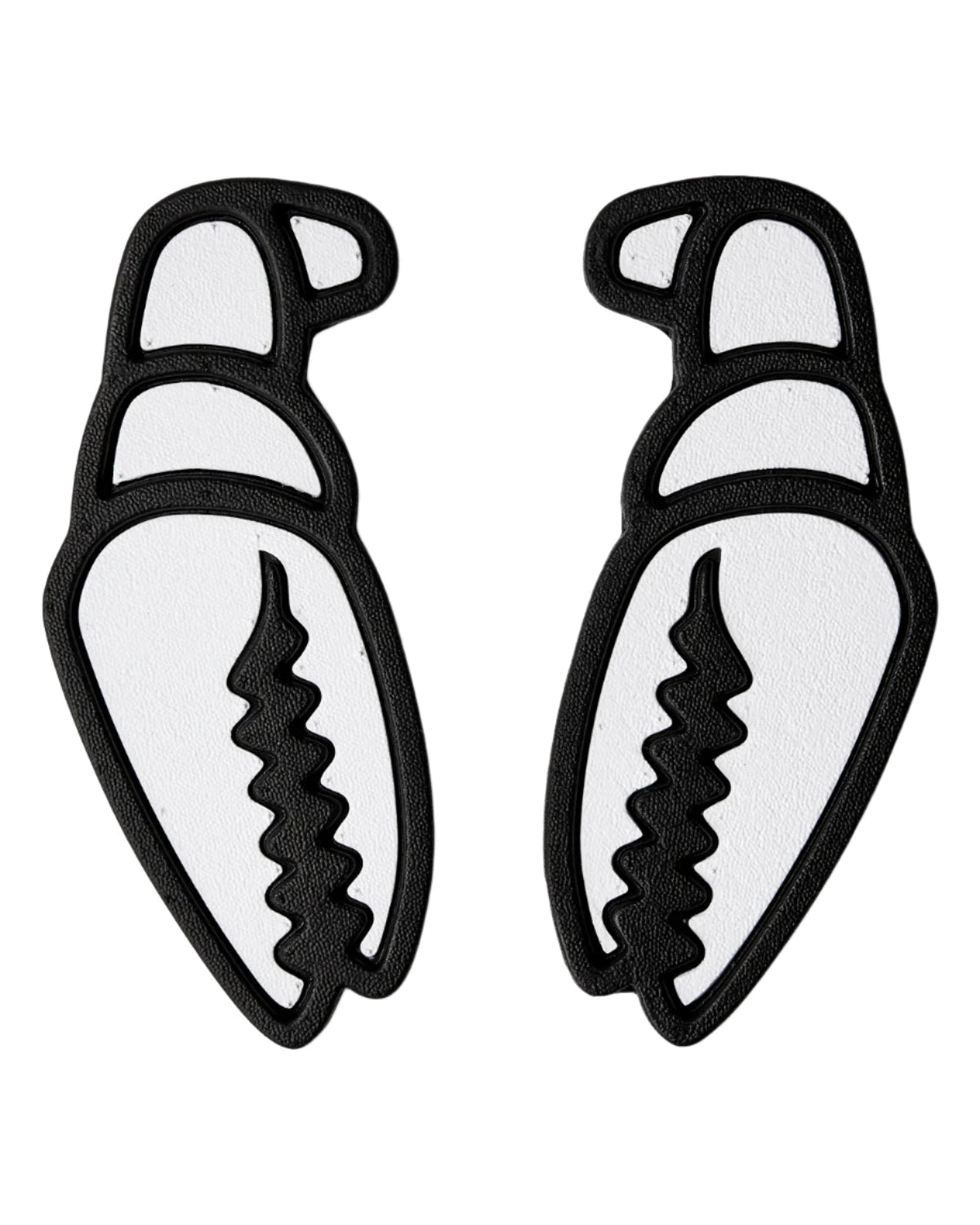 Crab Grab Mega Claw Stomp Pad 2025 - A black stomp pad with a wavy, claw-like design on top and a smooth bottom.