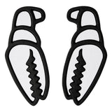 Crab Grab Mega Claw Stomp Pad 2025 - A black stomp pad with a wavy, claw-like design on top and a smooth bottom.