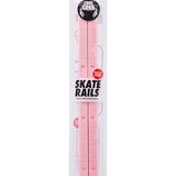 Crab Grab Skate Rails - 2025 pink snowboard bindings with white lettering on top strap and black lettering on bottom strap.