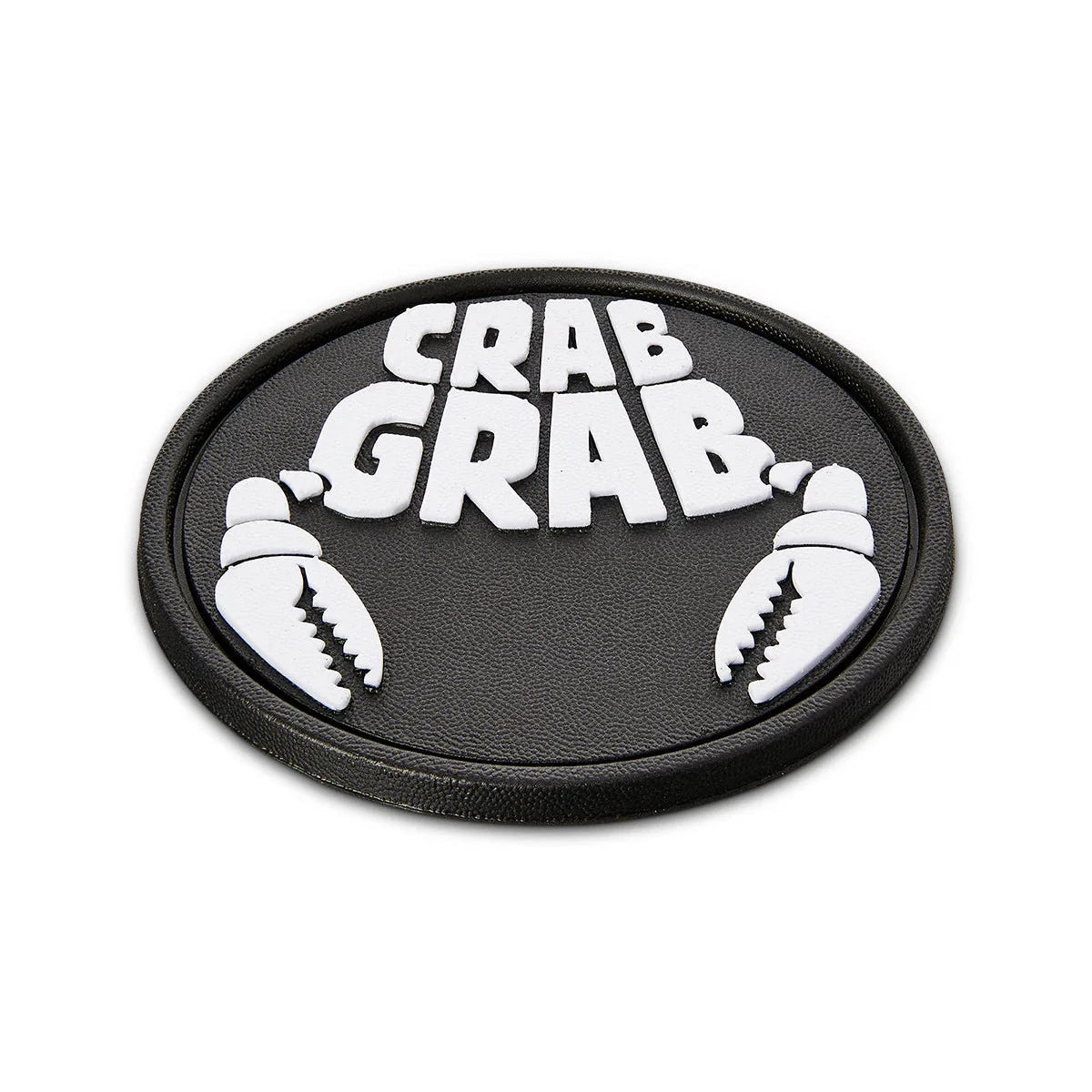 Crab Grab The Logo Stomp Pad 2025 - A black oval-shaped pad with a raised white logo featuring the words "CRAB GRAB" in bold block letters, flanked by two crab claws on either side.