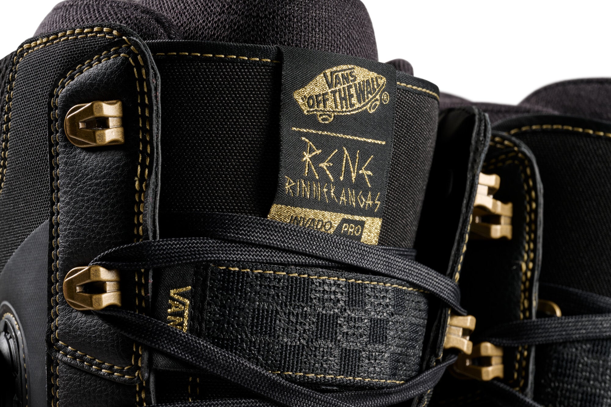 Vans Invado Pro Limited Edition Snowboard Boots 2026 - Black snowboard boots with gold accents and a textured pattern on the side.