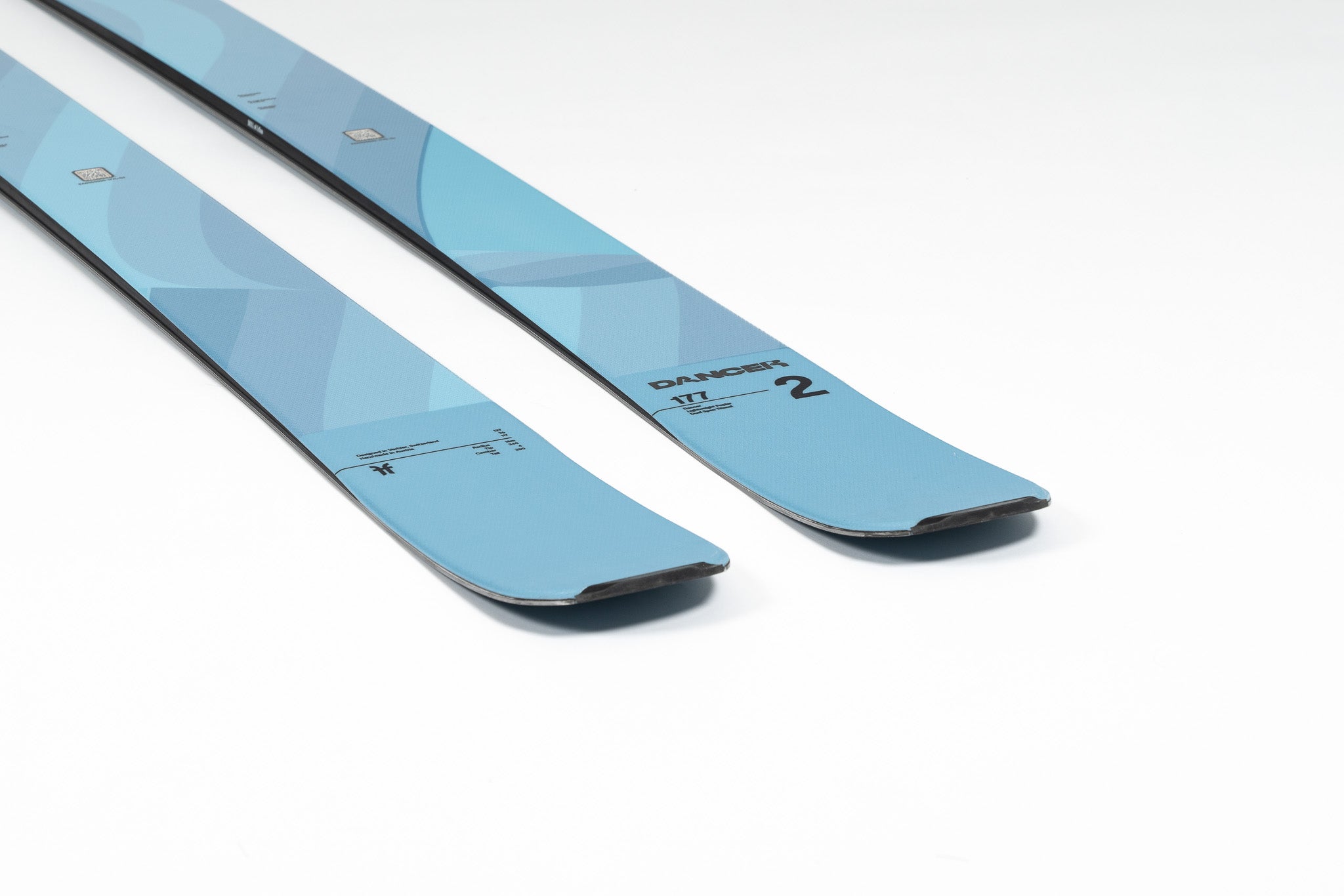 Faction Dancer 2 Ski 2026 - A light blue ski with a geometric pattern and black trim along the edges.