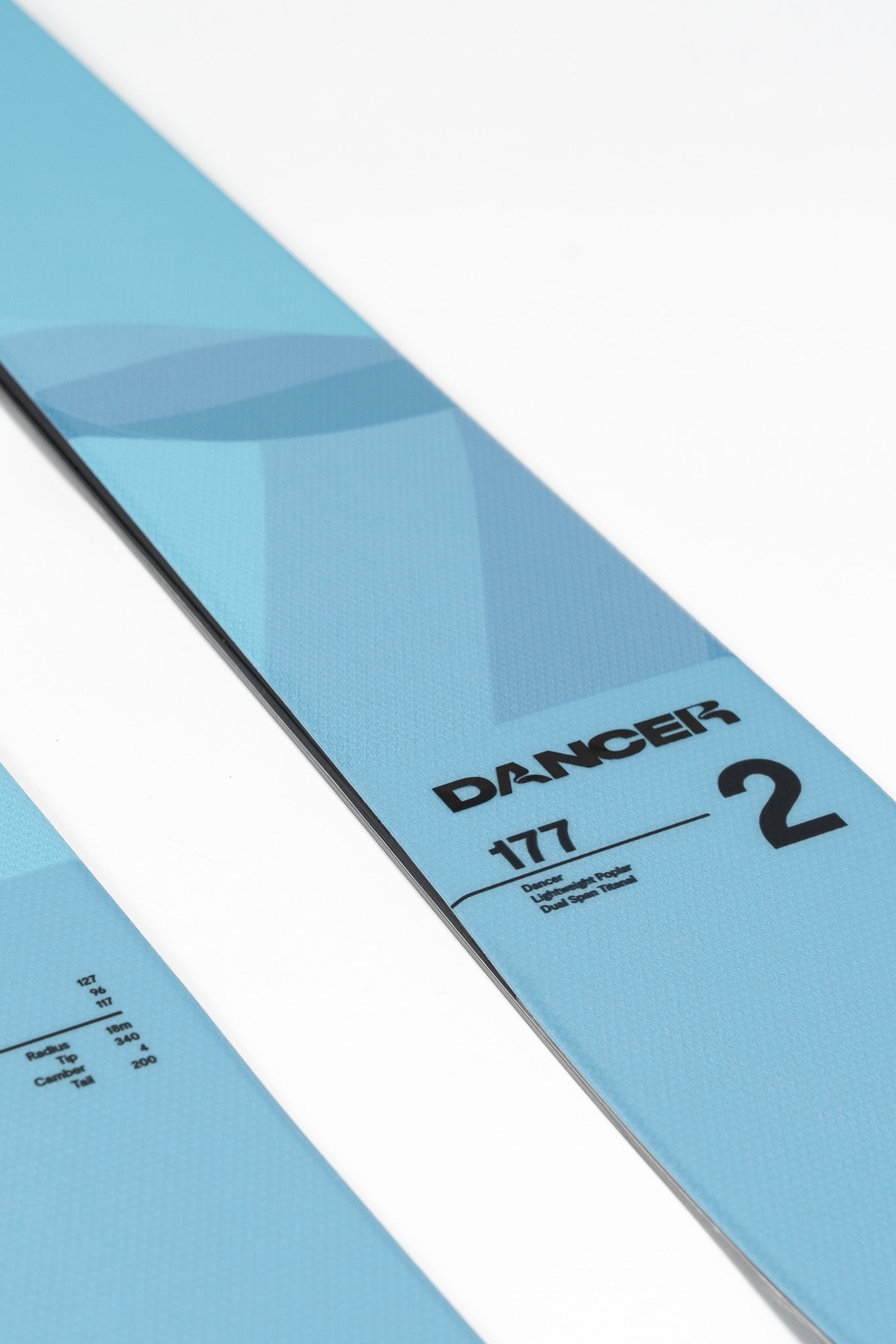Faction Dancer 2 Ski 2026 - A light blue ski with a darker blue stripe on top and a black tip.