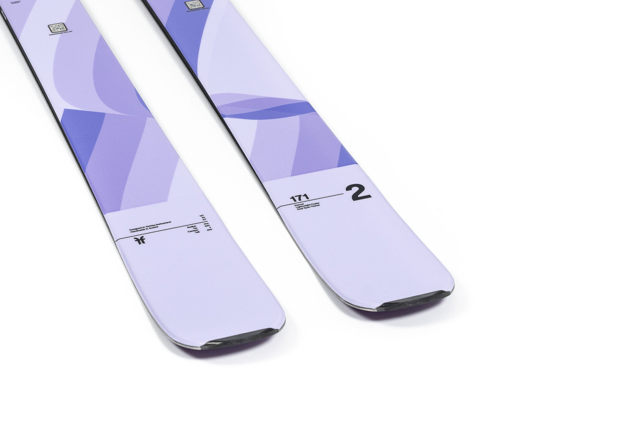 Faction Dancer 2 Ski 2026 - White skis with blue geometric pattern on top and black bindings.