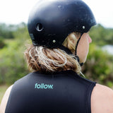 Follow Corp Impact Vest 2024 - Black vest with white logo on chest.