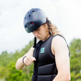 Follow Corp Impact Vest 2024 - Black vest with a green logo on the chest.