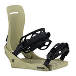 Fix Nation Snowboard Binding - A tan snowboard binding with a black buckle on the right side and a small logo in the bottom left corner.