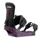Fix Women's January Snowboard Binding 2024 - A black snowboard binding with a purple base and straps, featuring the word "January" in small letters on the side.
