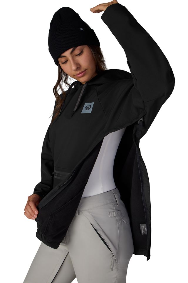 Women's black waterproof hoodie with adjustable hood and logo patch, long sleeves
