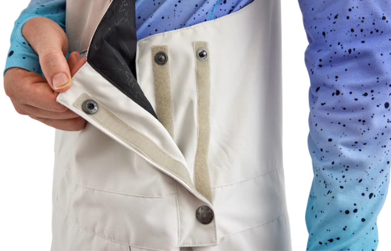 Airblaster Freedom Shell Bib 2025 - White bib with black zipper and snap buttons.