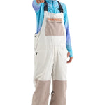 Airblaster Freedom Shell Bib 2025 - A white bib with a tan patch on the front, featuring orange lettering that reads "AIRBLASTER".