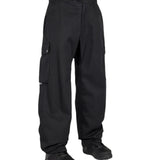 Airblaster Freedom Boss Shell Pant 2025 - Black pants with a zippered pocket on the thigh and a belt loop at the waist.