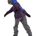 Airblaster Freedom Boss Shell Pant 2025 - Black snow pants with a subtle pink pattern and blue accents on the side pockets.