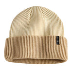 Autumn Select Blocked Beanie 2025 - A cream-colored beanie with a ribbed texture and a small black tag on the front.