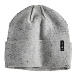 Autumn Select Daze Beanie 2025 - A light gray beanie with a subtle speckled pattern and a small black tag on the front.